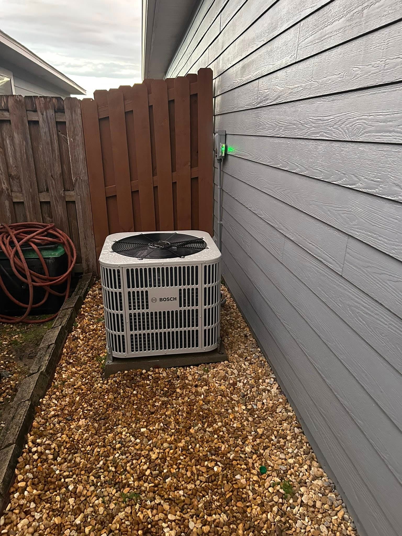 HVAC technician performing an A/C tune-up
